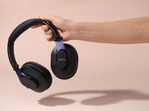 hand holding Lenire headphones